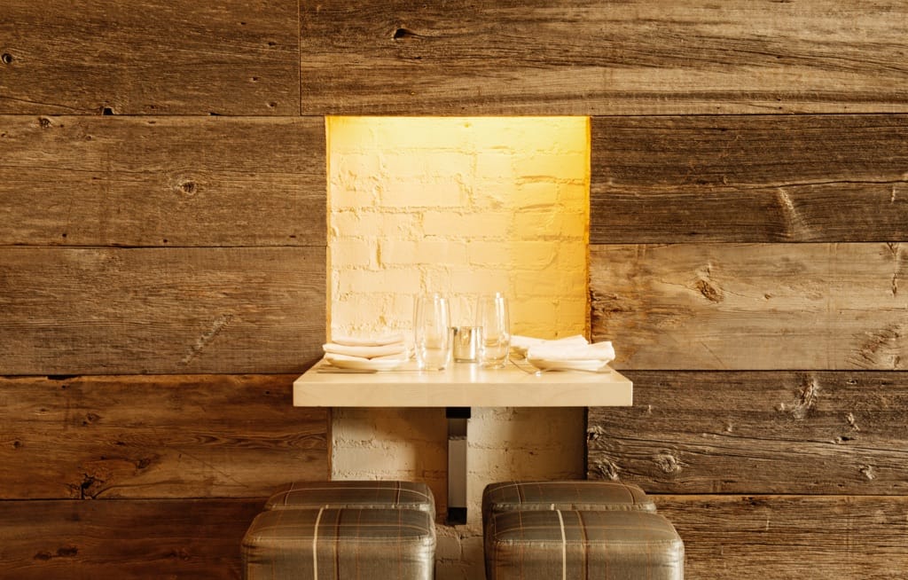 A dining room high top table at Taverna San Marco.